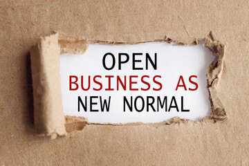 OPEN BUSINESS AS NEW NORMAL. text on white paper over torn paper background.