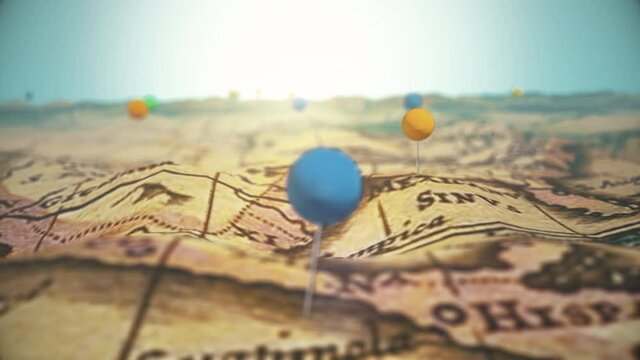 Travel destinations across old map marked with push pins. Tourism journey concept