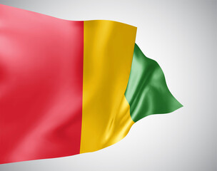 Guinea, vector flag with waves and bends waving in the wind on a white background.
