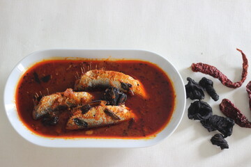 Sardines curry is a traditional central Kerala fish curry also known as mathi curry.