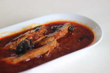 Sardines curry is a traditional central Kerala fish curry also known as mathi curry.