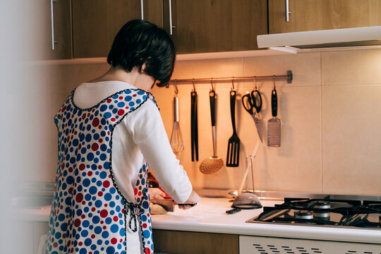 Young Female Chef Cooking In Retro Vintage Kitchen At Home - Hand Made Bakery Concept - Focus On Woman Back