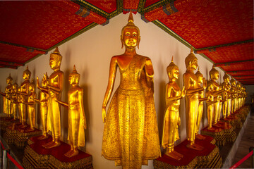 Effigy of Buddha stands proud in the Cloister at the Wat Pho Temple in Bangkok, Thailand.  