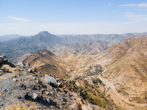 Elabered, Eritrea - January 15, 2021: Travelling around the vilages near Asmara and Massawa. An amazing caption of the trees, mountains and some old typical houses with very hot climate in Eritrea. 