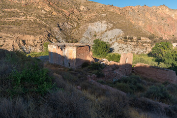 Ruined and abandoned farmhouse on a mountain in southern Spain