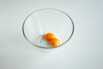 two eggs in a transparent bowl