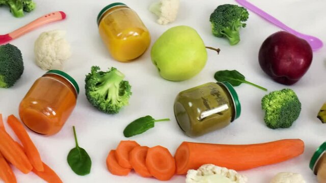 baby puree with vegetables and fruits. selective focus.