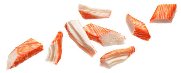 Falling snow crab sticks pieces isolated on white background © xamtiw