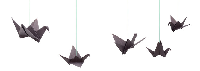 Black paper origami birds hanging with string