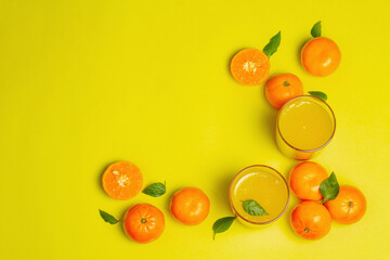 Sweet fruit jelly from fresh oranges and tangerines on summer yellow background