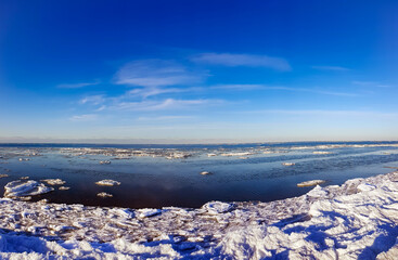 Panorama of winter Baltic Sea with snow and ice in Riga, Latvia. Baltics in winter.