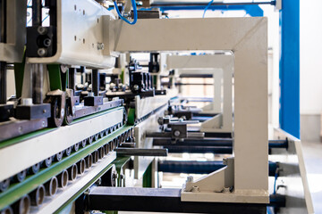 A industrial commercial envelope making machine, making paper envelopes for international...