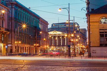 Wroclaw evening street with beautiful old buildings and transport