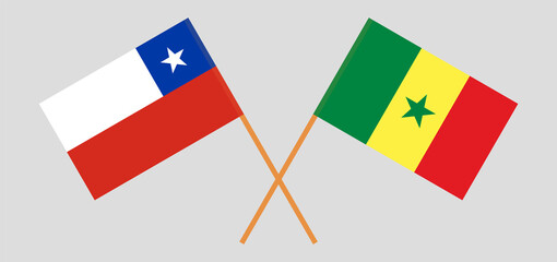 Crossed flags of Chile and Senegal