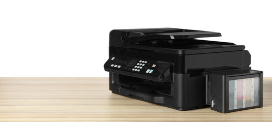 Obraz premium New modern multifunction printer on wooden table
