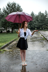 girl with umbrella in the rain