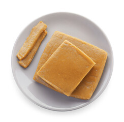 Plate with fresh quince paste isolated on white, top view