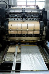 Offset printing machine feeder transfer metallic paper through the feeding table to the printing...
