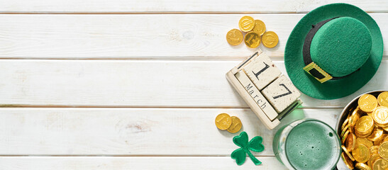 St. Patricks day concept - green beer and symbols, rustic background. Part invitation.