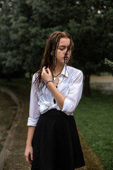 Fototapeta na wymiar young woman in the rain