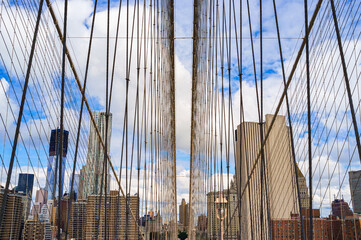 Skyward view of the famous Brooklyn Bridge in New York city