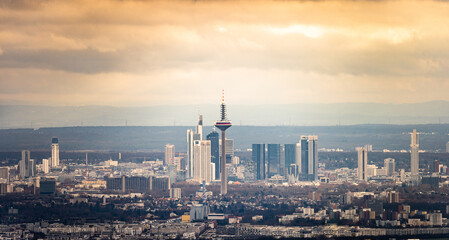 The skyline of the financial district of Frankfurt at sunset blue hour with fantastic sky and clouds
