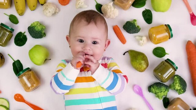 baby puree with vegetables and fruits. selective focus.