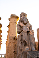 ramesses II ,Luxor ,EGYPT, Egypt Luxor Temple. granite Statue of Ramesses II seated in front of...