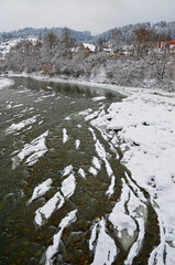 The Black Cheremosh River is covered with ice and snow