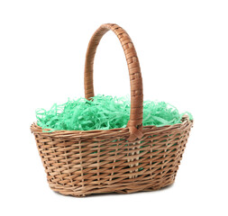 Easter basket with green paper filler isolated on white