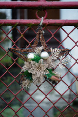Christmas decoration on the fence.