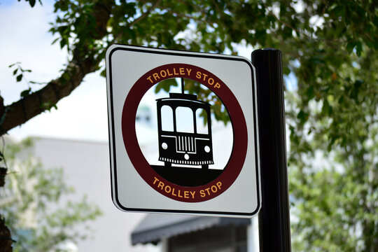 Tourist Trolley Bus Stop Sign On A City Street In West Palm Beach, Florida