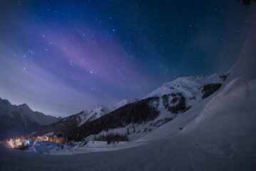 Fototapeta na wymiar winter night in the alps with snow and stars