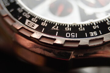 Closeup macro of an old watch dial.