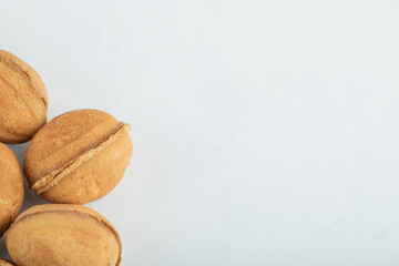 Walnut sweet cookies on a white background