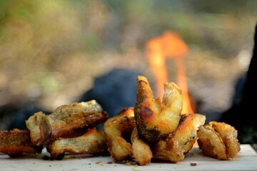 The preparation of the fish caught on fire.