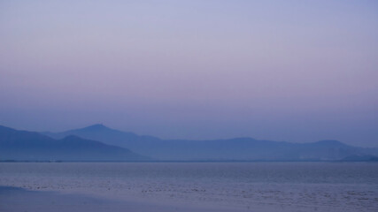 The mountains beyond the sea are like mountains