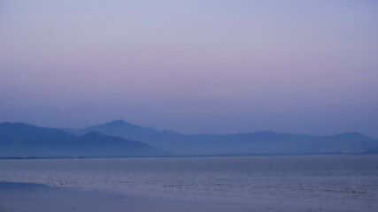 The mountains beyond the sea are like mountains