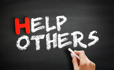 Help Others text on blackboard, help concept background