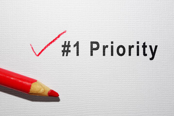 Number one text with red pencil checkmark on paper