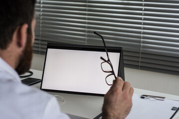 Doctor using tablet telemedicine telehealth concept