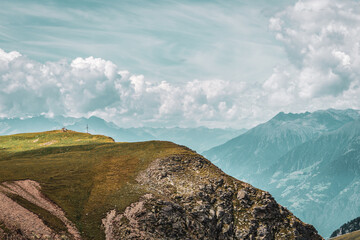 panoramic view of the Dolomites with beautiful weather clouds , Italy.
