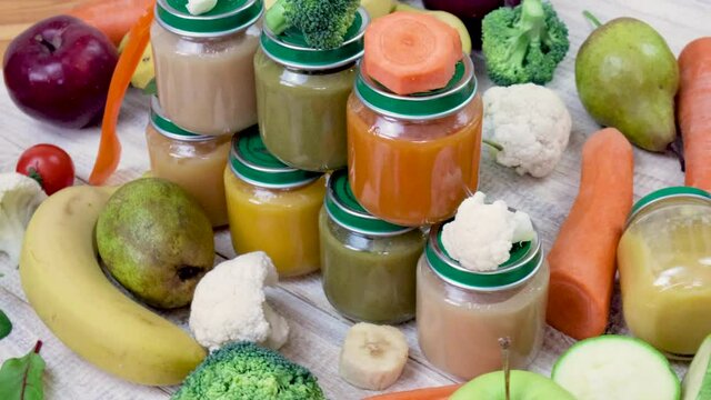 baby puree with vegetables and fruits. selective focus.