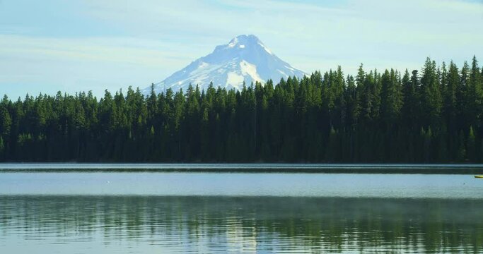 Wide, People Kayak On Timothy Lake With Mt. Hood In Distance