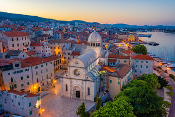 Sunrise aerial view of the cathedral of Saint James and waterfront of Sibenik, Croatia © dudlajzov