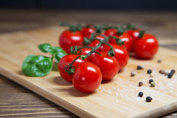 Cherry tomatoes on rustic background