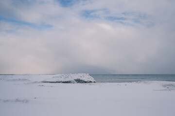 waves crashing on the beach
Lake Michigan frozen in a cold Chicago winter