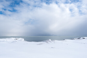 Fototapeta na wymiar Lake Michigan frozen in a cold Chicago winter