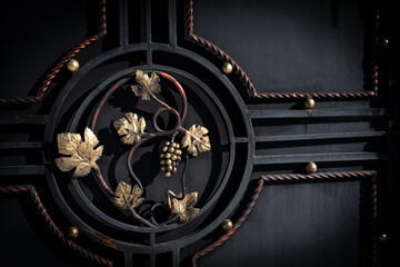 Modern decoration with wrought iron elements of metal doors