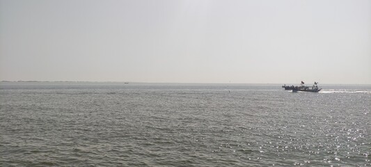 KARACHI, PAKISTAN - FEBRUARY 17, 2021: IMAGE TAKEN OF THE BEAUTIFUL SEA DURING DAY TIME IN KARACHI PAKISTAN.